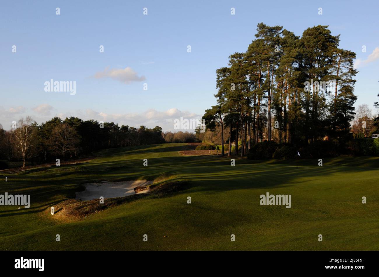 View from Clubhouse over 18th Green to 18th Fairway with Bunker to left