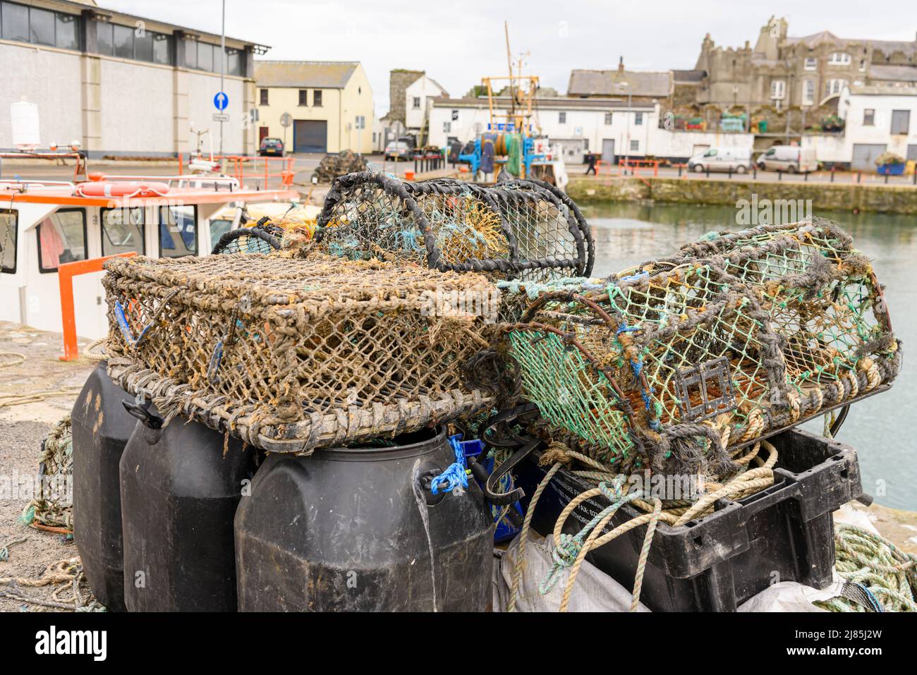 Stack of lobster pots at Ardglass harbour, Northern Ireland Stock Photo