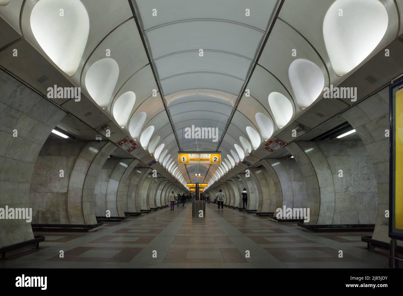 Interior of Anděl Station of the Prague Metro in Prague, Czech Republic. The underground station previously known as Moskevská Station (Moscow Station) was designed by Soviet modernist architect Lev Popov and completed in 1985. Lamps in the shape of eggs are very typical for his projects of underground stations. Stock Photo