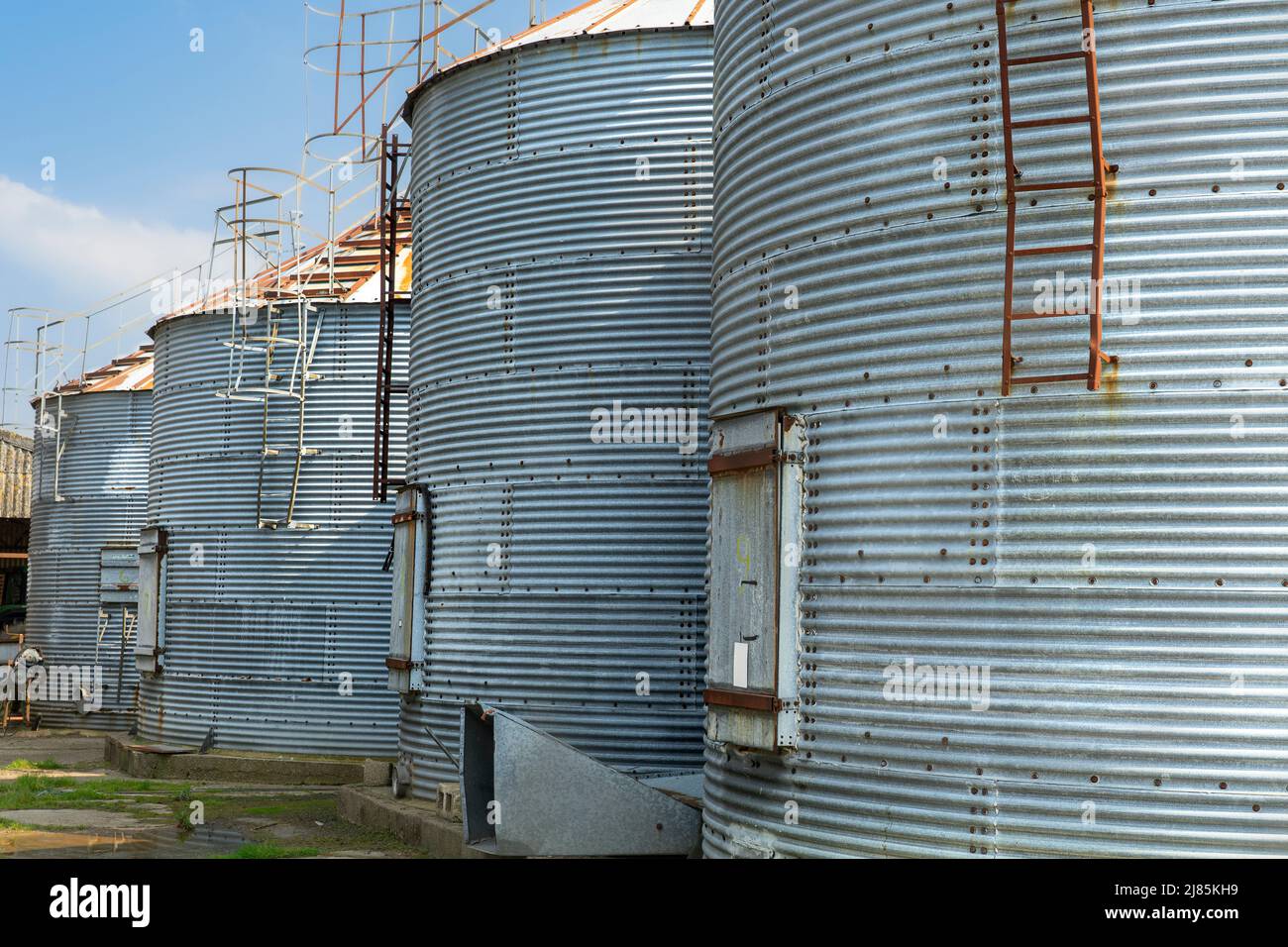 Close up of old disused grain silos on a farm Stock Photo