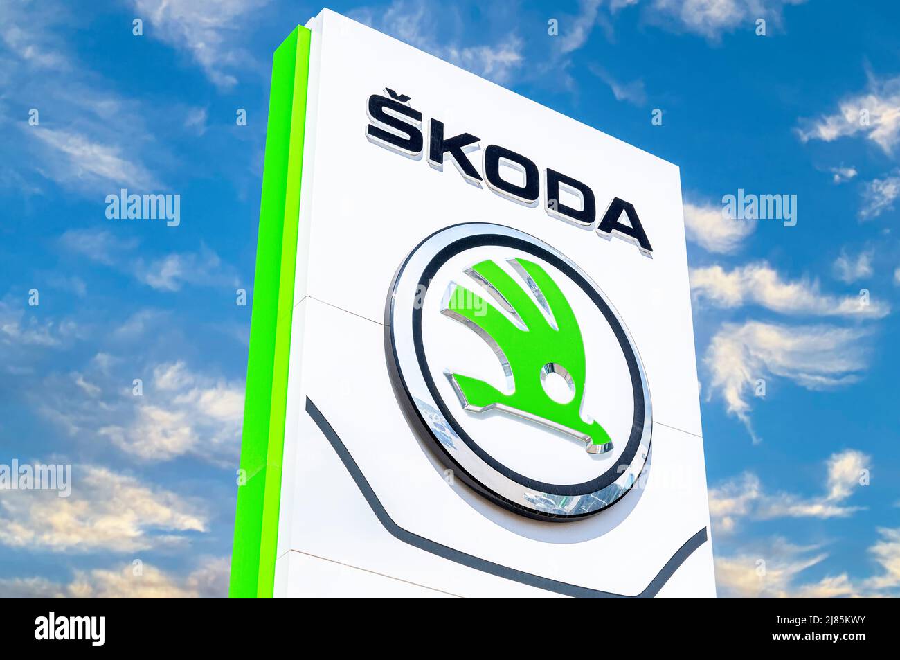 Samara, Russia - May 8, 2022: Skoda dealership signboard against the sky. Skoda Auto is an automobile manufacturer based in the Czech Republic Stock Photo