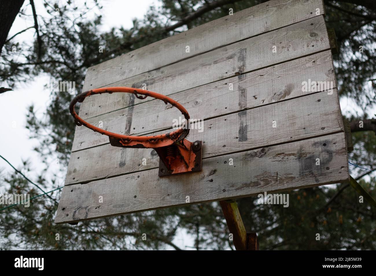 old basketball hoop without net in rural countryside. Play basketball