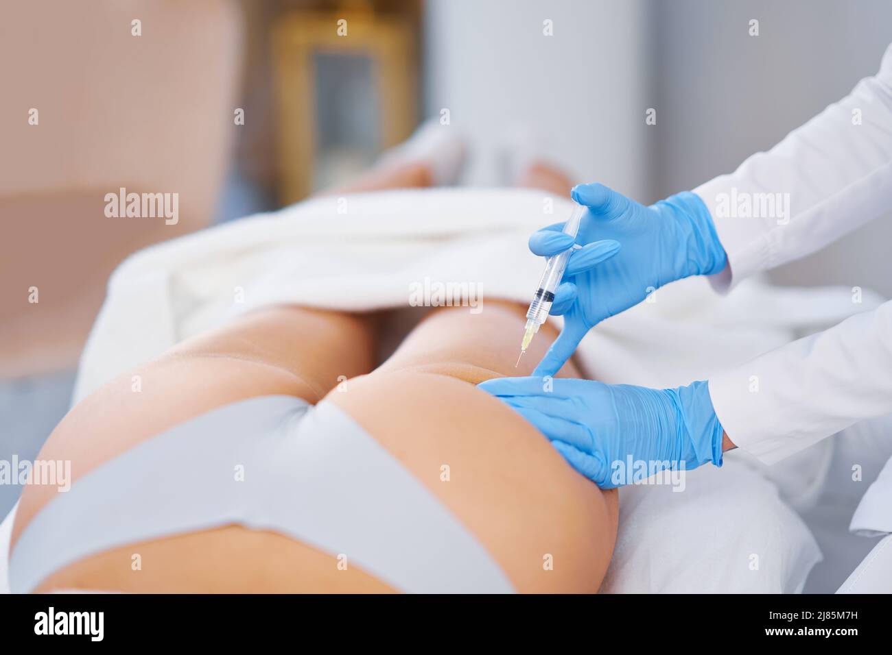 Belly injection of injection lipolysis, body shaping treatment. Close up  Stock Photo - Alamy