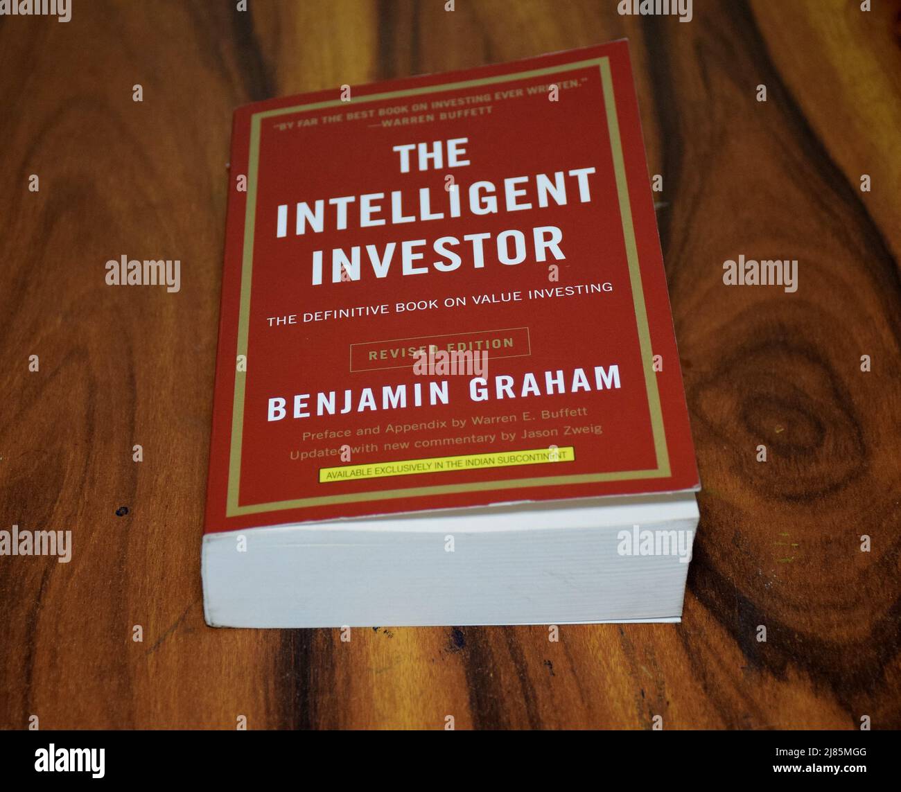 Benjamin Graham The Intelligent Investor Book lying over a wooden table is  the best book on stock market investing till date Stock Photo - Alamy