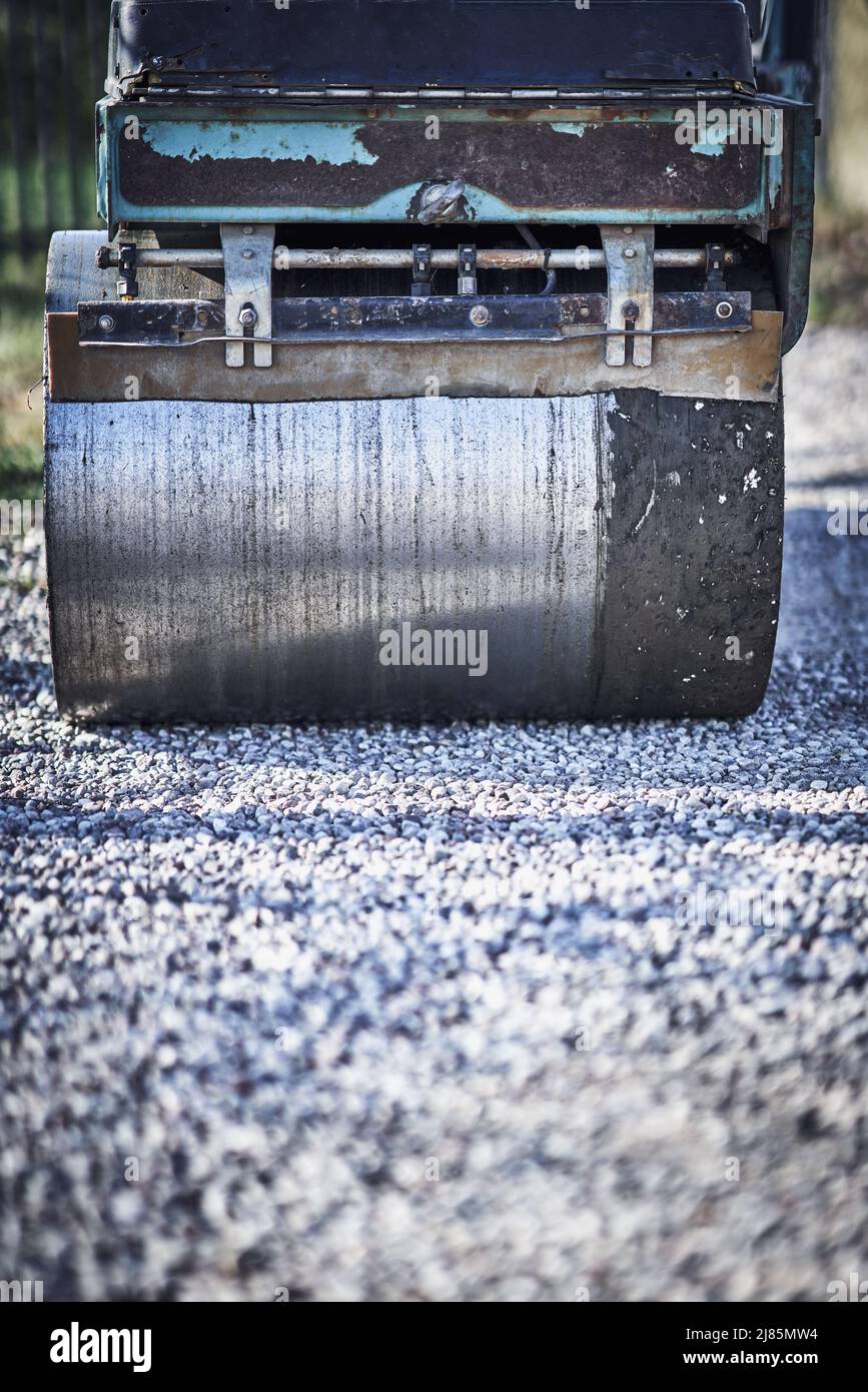 Picture of a road roller machine on the different surfaces Stock Photo
