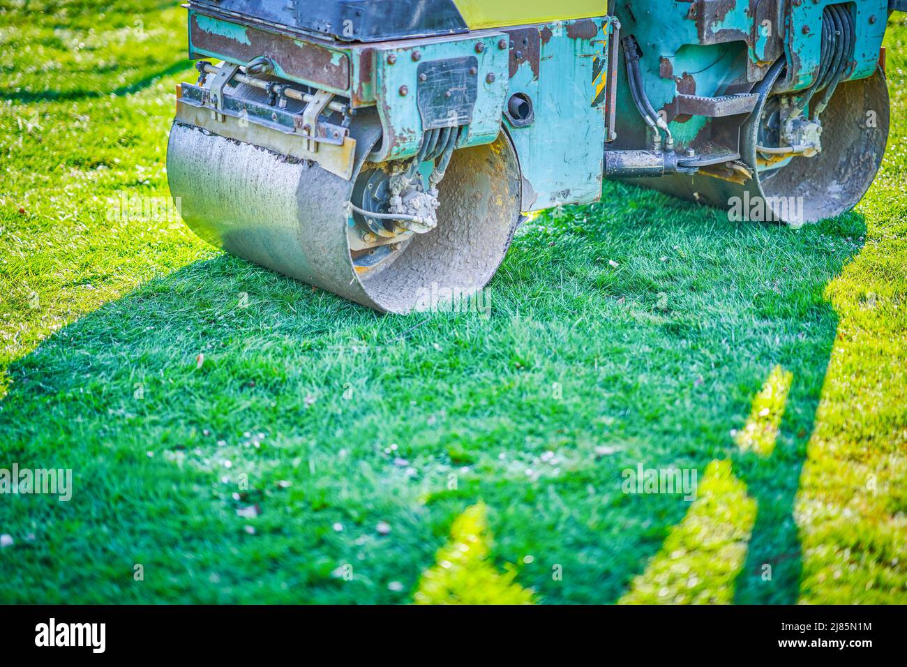 Picture of a road roller machine on the different surfaces Stock Photo