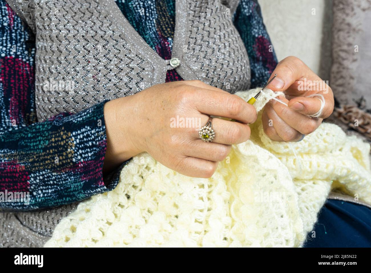 Woman Wear Blue Jeans, White Woolen Sweater, Sock And Moss Green