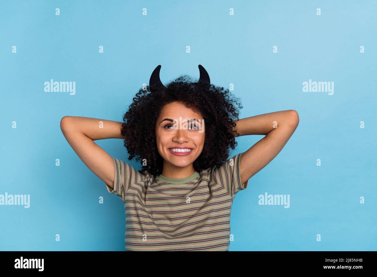Photo of magic creature lady in horns headband hands head dream rest
