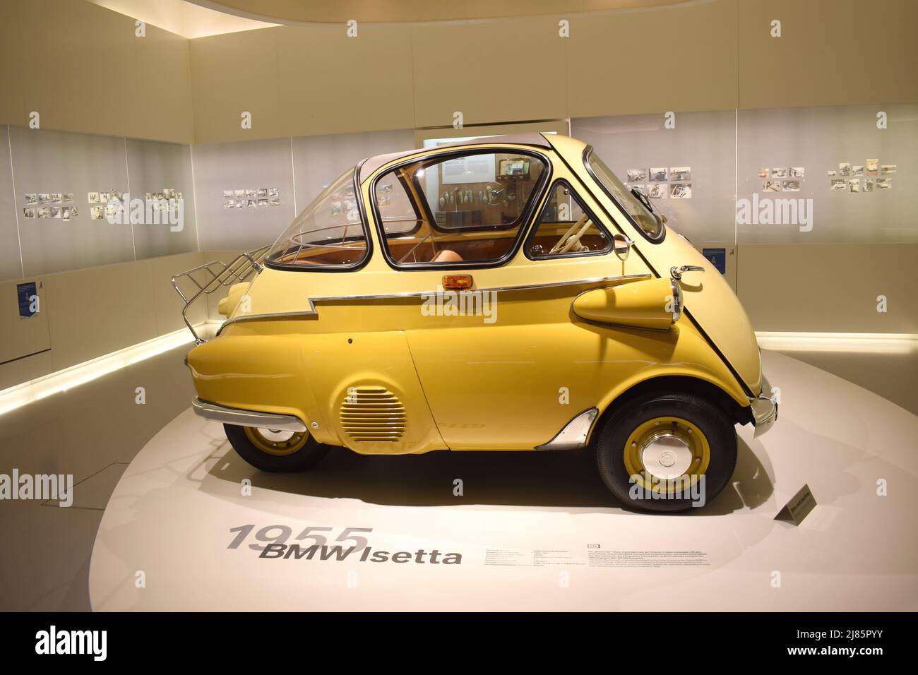 BMW Isetta. A yellow -three wheel- car (single-cylinder car) of BMW (model Isetta 250, 1955) at BMW Museum in Munich, Germany Stock Photo