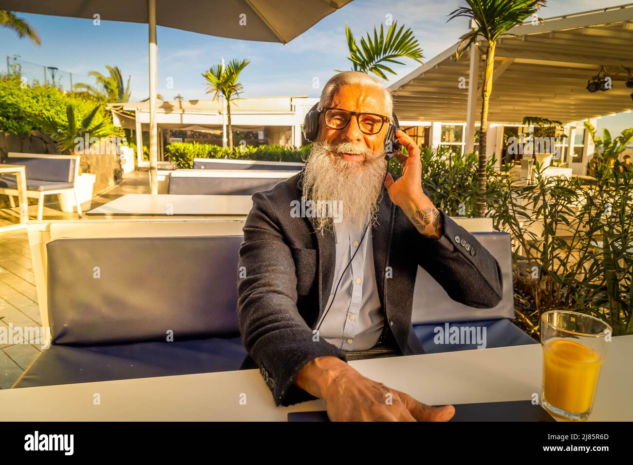Senior man working with laptop Stock Photo