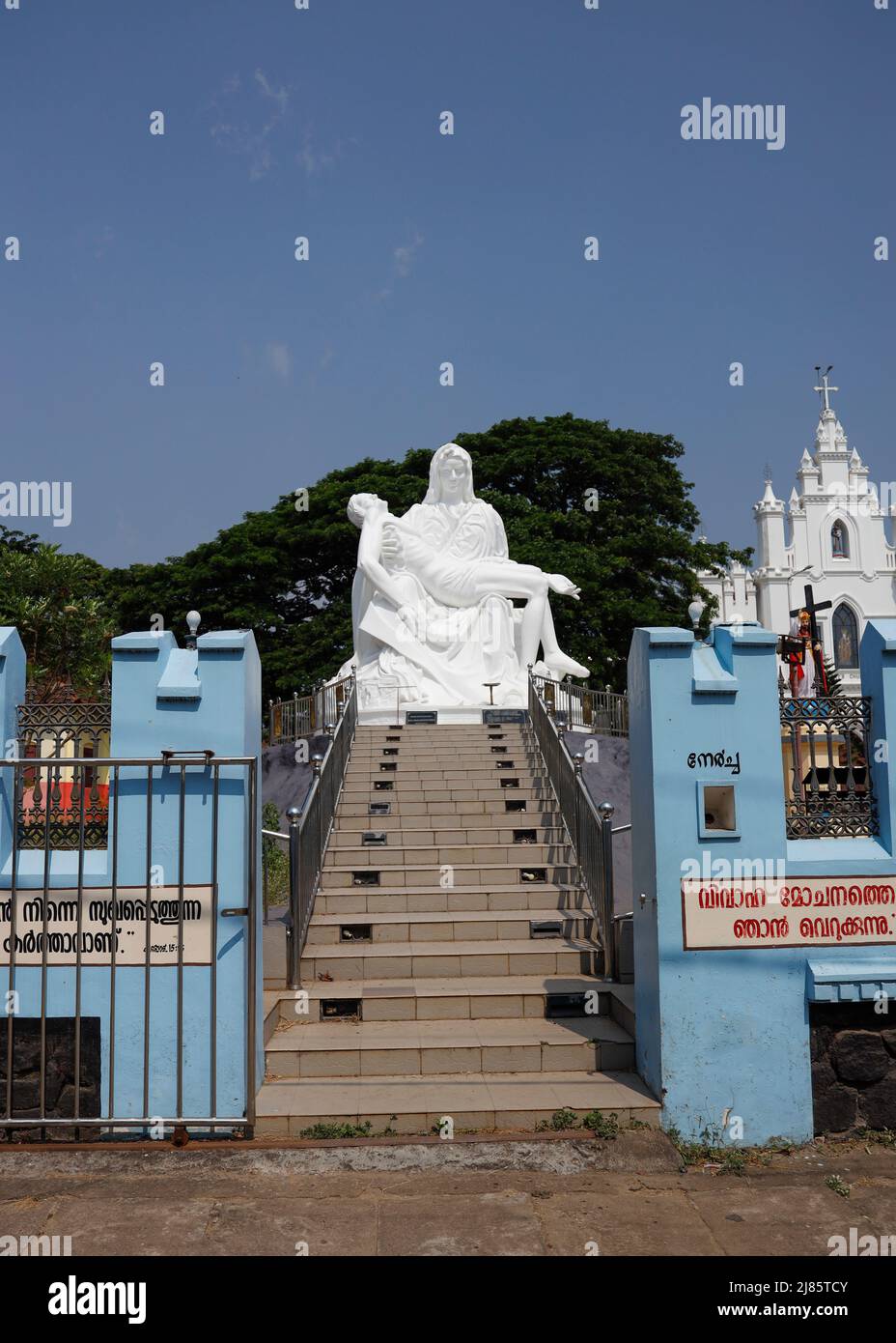 Huge Pieta Statue Replica of Jesus Christ and Mother Mary next to St.Antony's Church in Tangassery,Kerala, India. Stock Photo