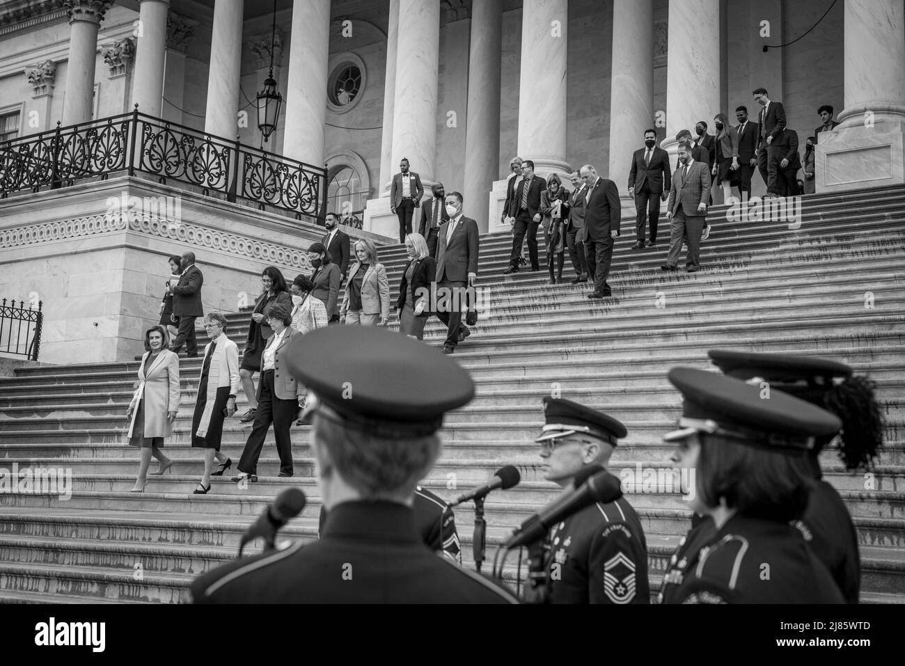 Washington, United States Of America. 12th May, 2022. Speaker of the United States House of Representatives Nancy Pelosi (Democrat of California) and a fraction of the Democratic members of the House of Representatives arrive for Moment of Silence for the One Million American Lives Lost to COVID-19, on the East Front Center Steps at the US Capitol in Washington, DC, Thursday, May 12, 2022. Credit: Rod Lamkey/CNP/Sipa USA Credit: Sipa USA/Alamy Live News Stock Photo