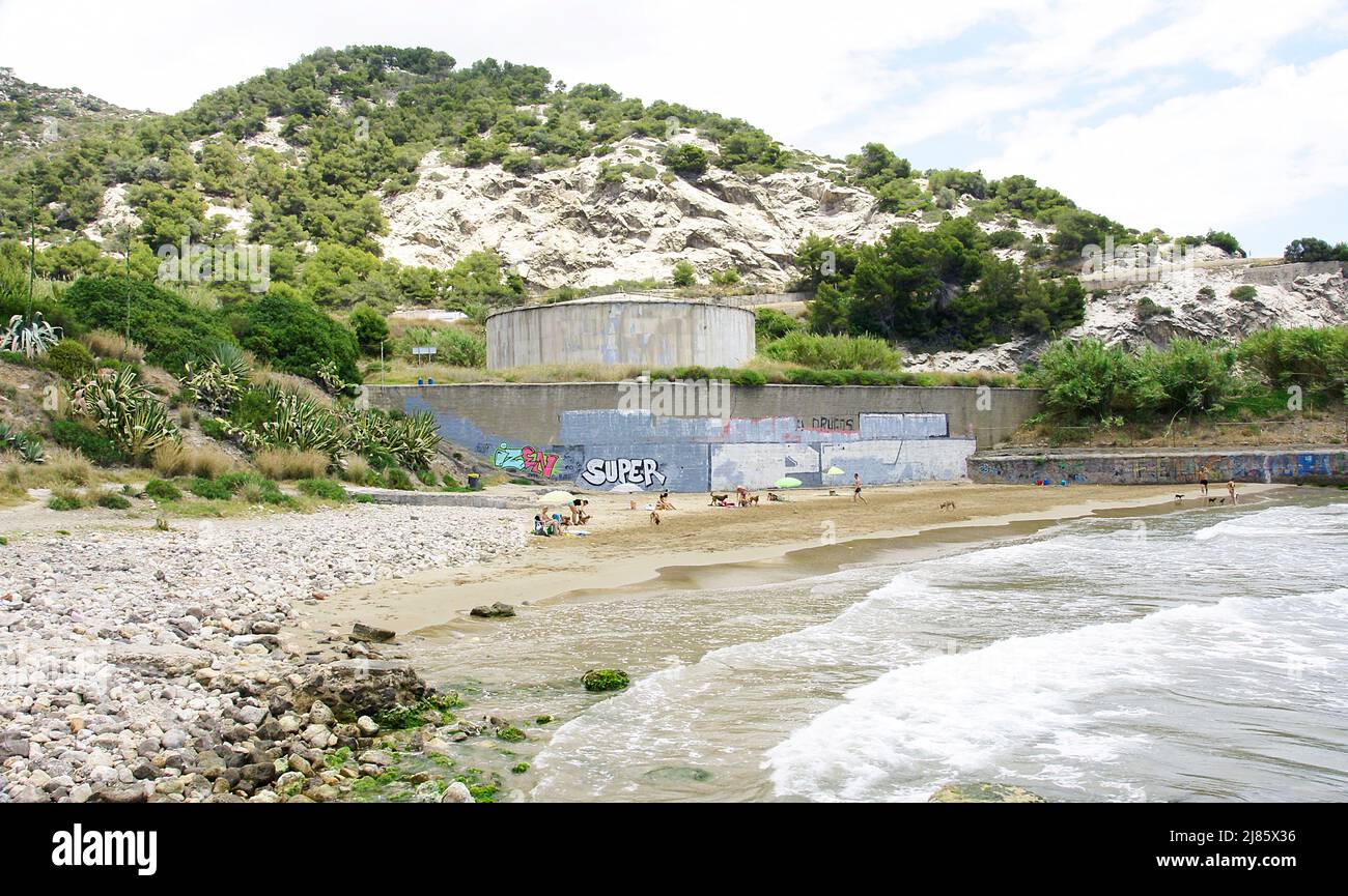 Waves and rocks at Vallcarca beach on the Costa del Garraf, Barcelona