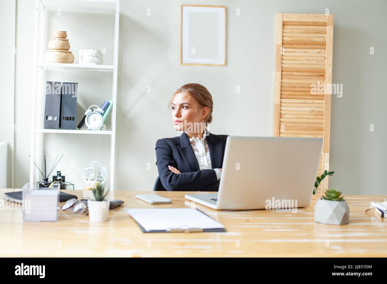 Business woman in black suit hi-res stock photography and images - Alamy