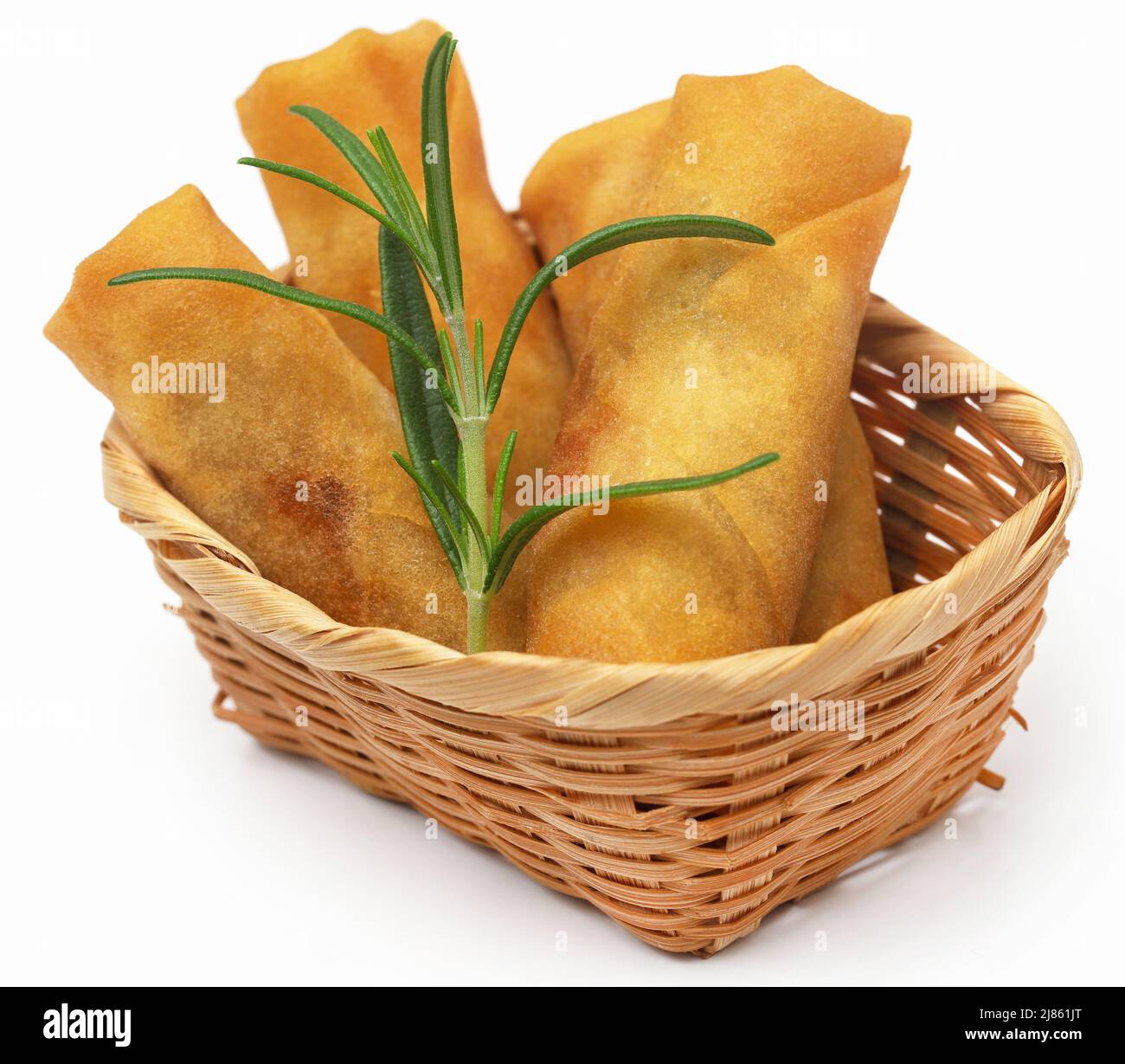 Vegetables rolls with rosemary over white background Stock Photo