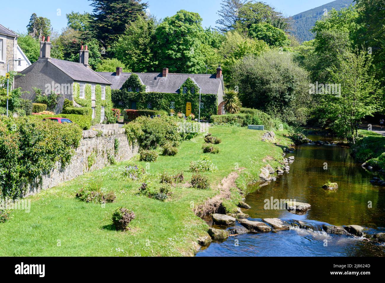 Picturesque cottages beside a river, Rostrevor, Northern Ireland. Stock Photo