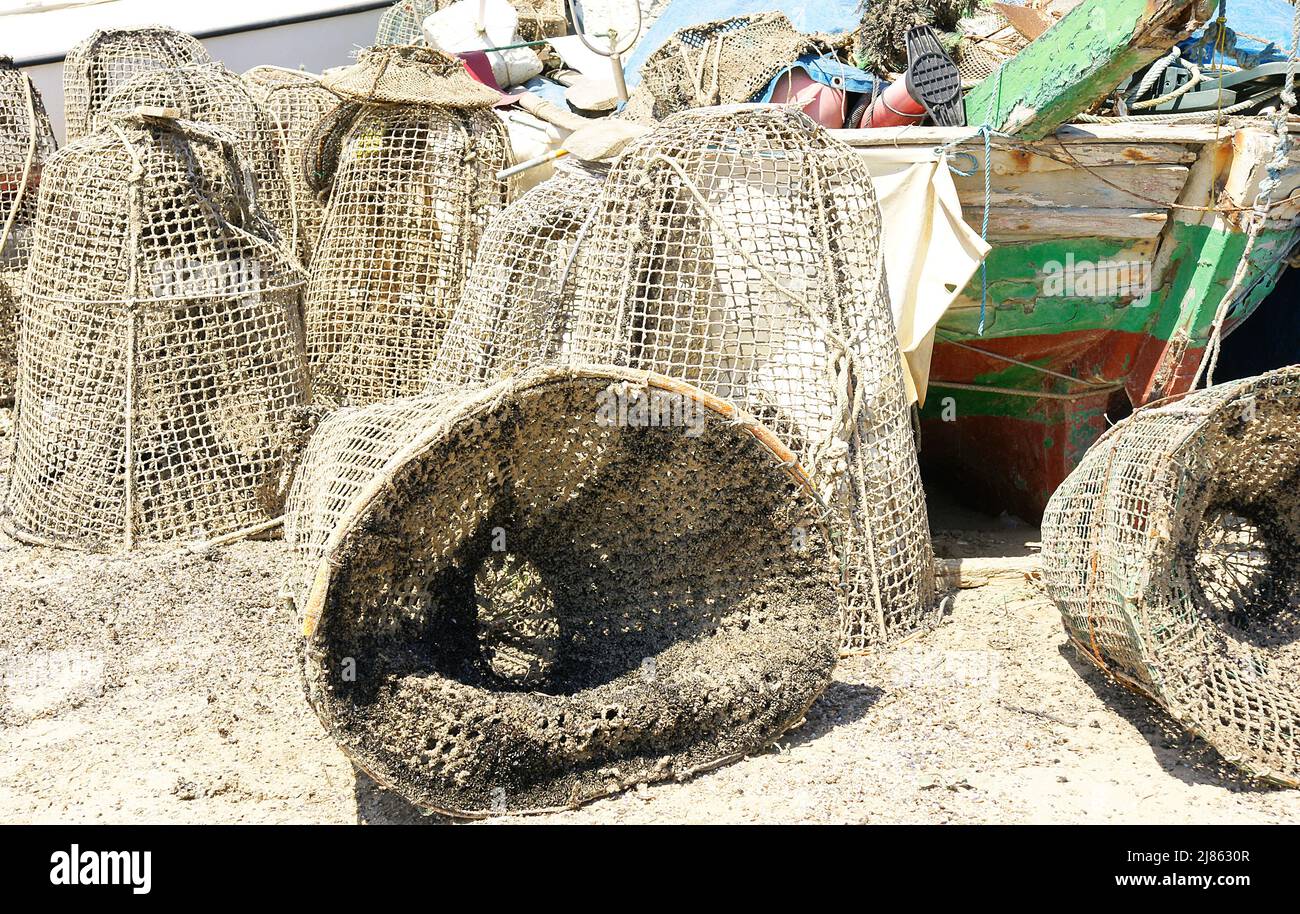 Cages and fishing gear on the beach of Castelldefels, Barcelona