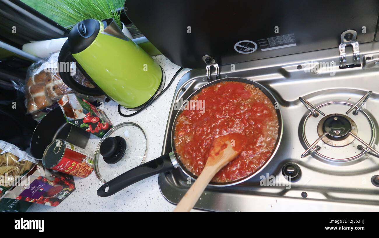 Campervan cooking Stock Photo