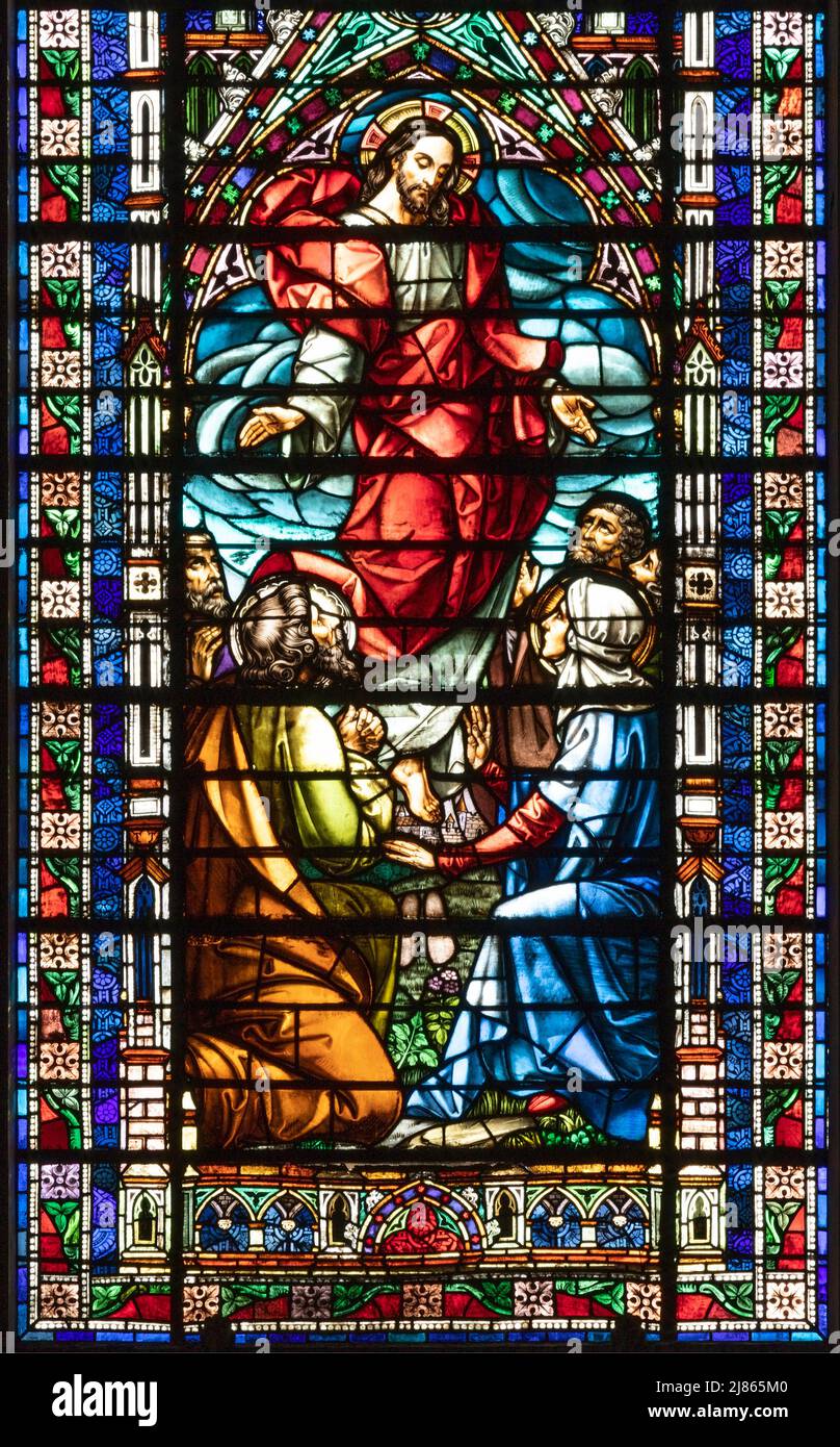 VALENCIA, SPAIN - FEBRUAR 17, 2022: The Ascension of the Lord in neo-gothic stained glass of  church Basilica de San Vicente Ferrer. Stock Photo