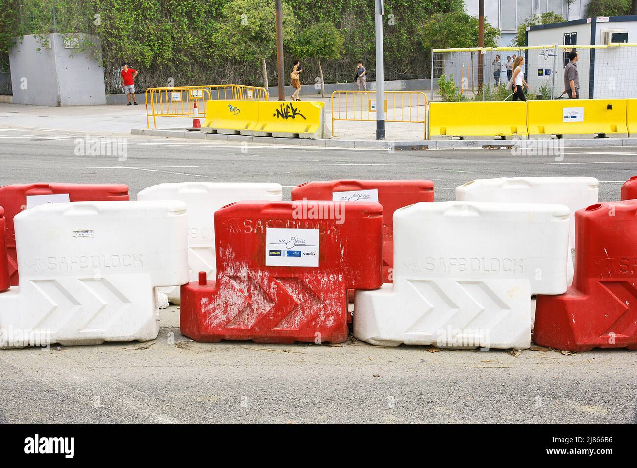 Provisional concrete or plastic barrier in the deconstruction works of the ring road in the Plaza de Les Glories in Barcelona, Catalonia, Spain Stock Photo
