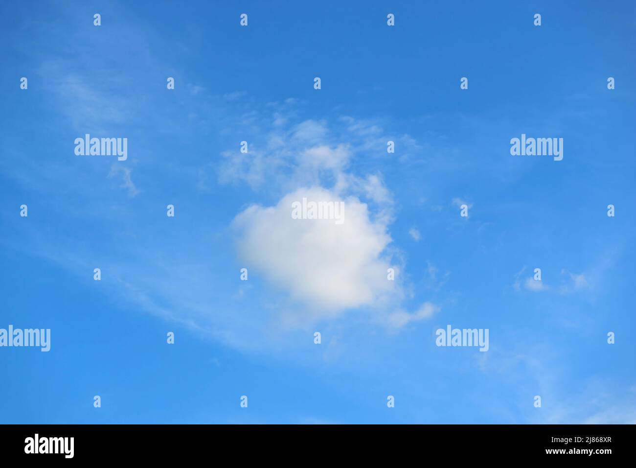 Fluffy Cumulus Clouds Floating on Bright Blue Sky Stock Photo - Alamy
