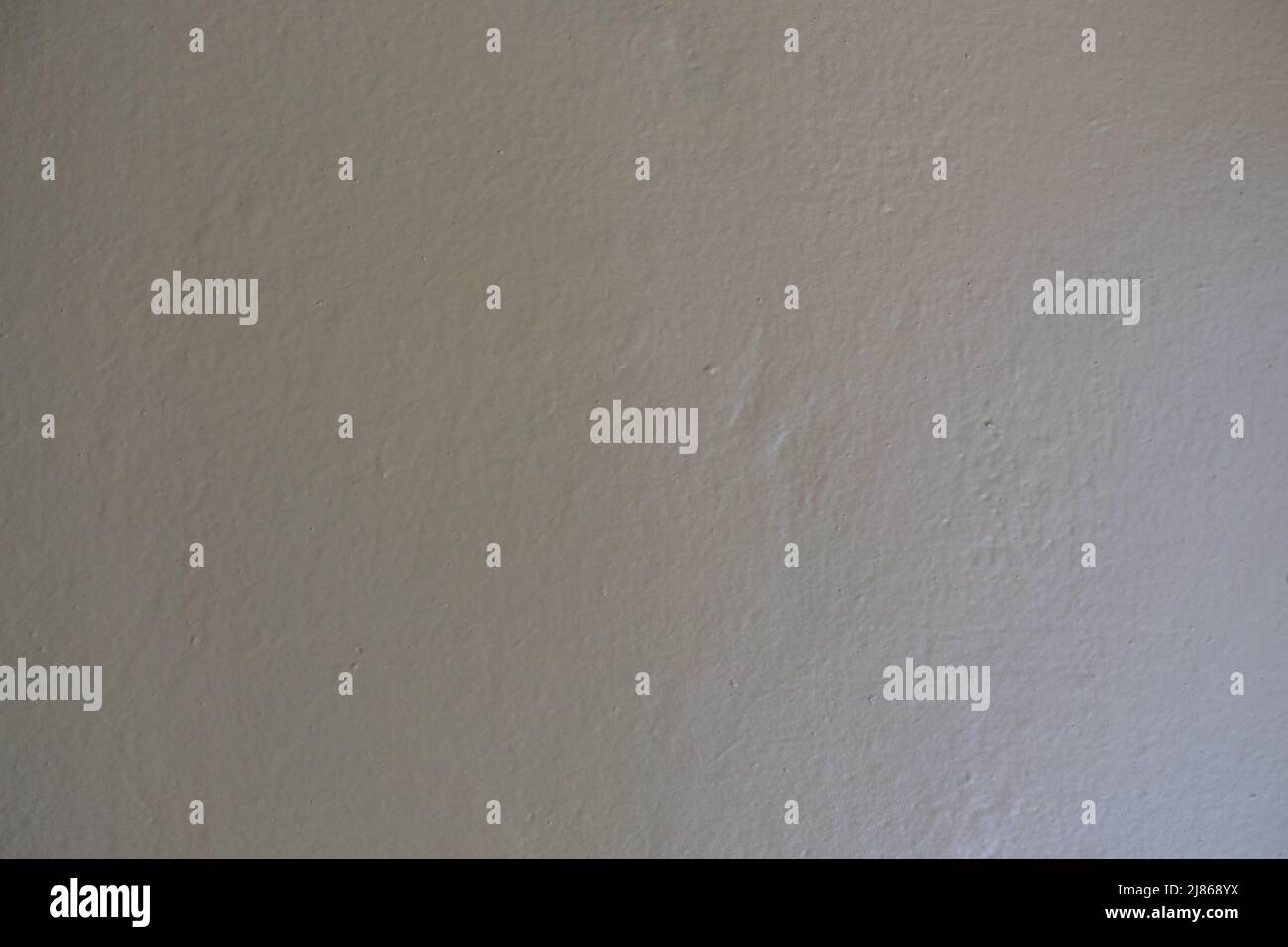 Gray yellow painted wall. Gradient background. Stock Photo