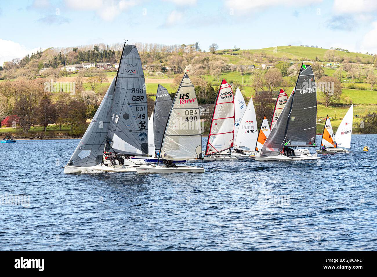 The start of a dinghy race at Ullswater Yacht Club in the English Lake District, Cumbria, England UK Stock Photo