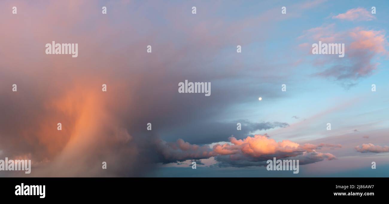 Fantastic soft thunderclouds at sunrise, natural composition Stock Photo