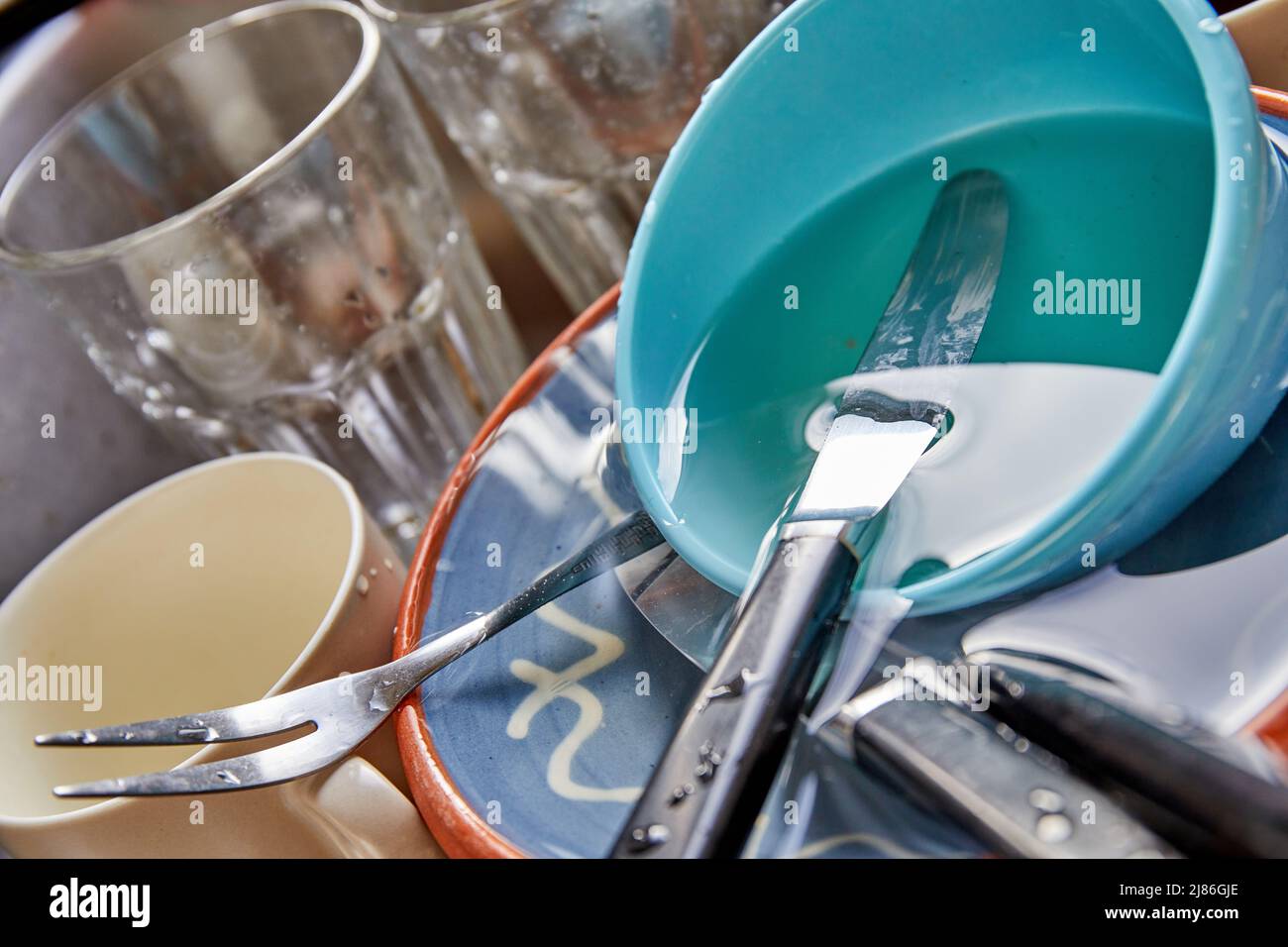 Dirty dishes, glasses, cutlery in kitchen sink Stock Photo Alamy