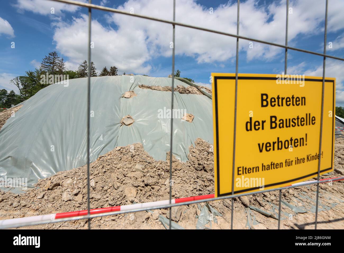 stadtallendorf-germany-13th-may-2022-covered-mounds-of-earth-on-the