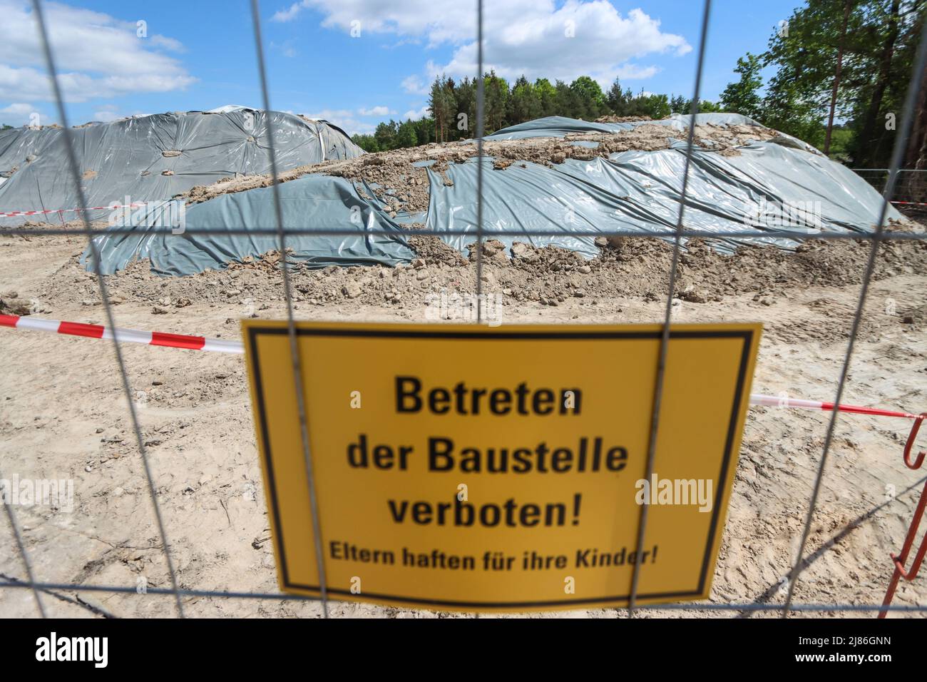 stadtallendorf-germany-13th-may-2022-covered-mounds-of-earth-on-the