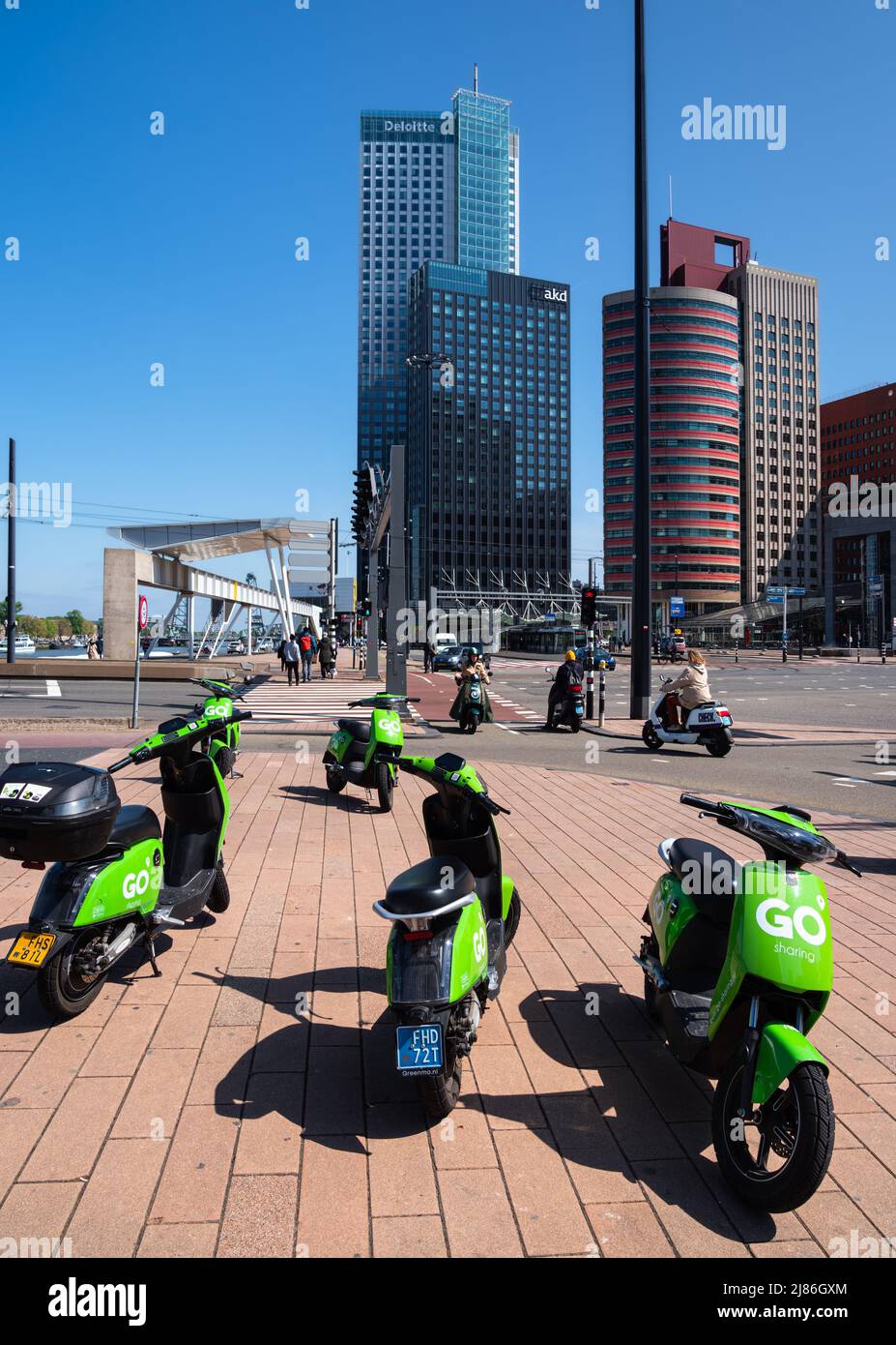 Rotterdam, Netherlands April 28, 2022 Scooters ,Office buildings and