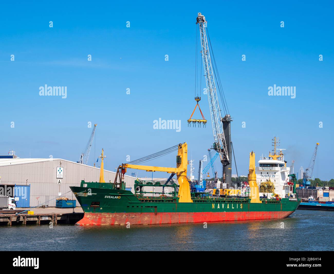 Rotterdam, Netherlands - April 28, 2022: Ship Navalis in the Industrial port of Rotterdam. Navalis Shipping is a shipbroker and break bulk operator. Stock Photo