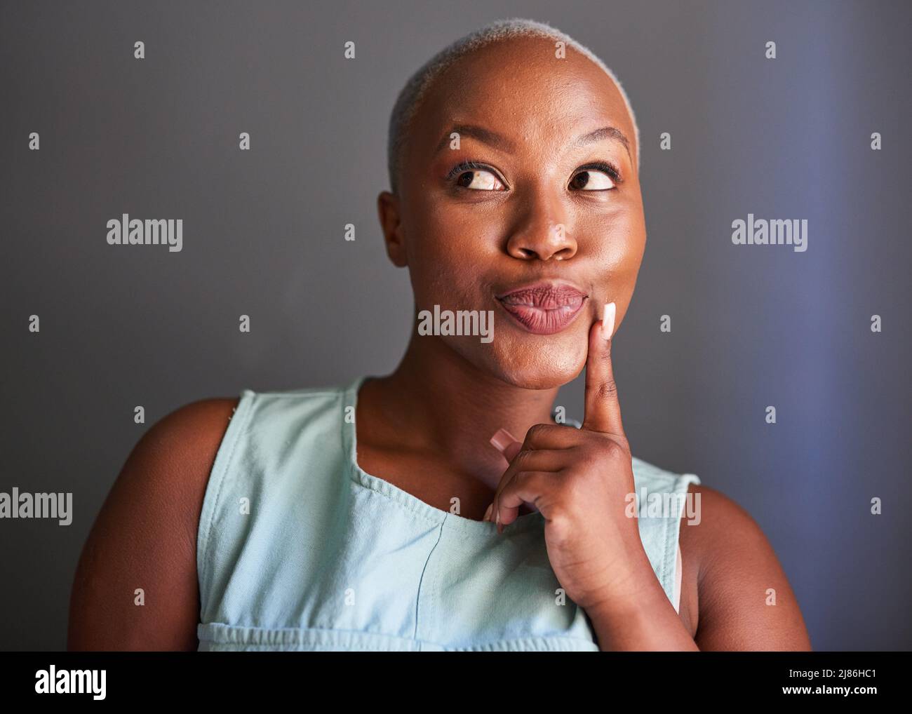 A young Black model poses silly face for the camera Stock Photo