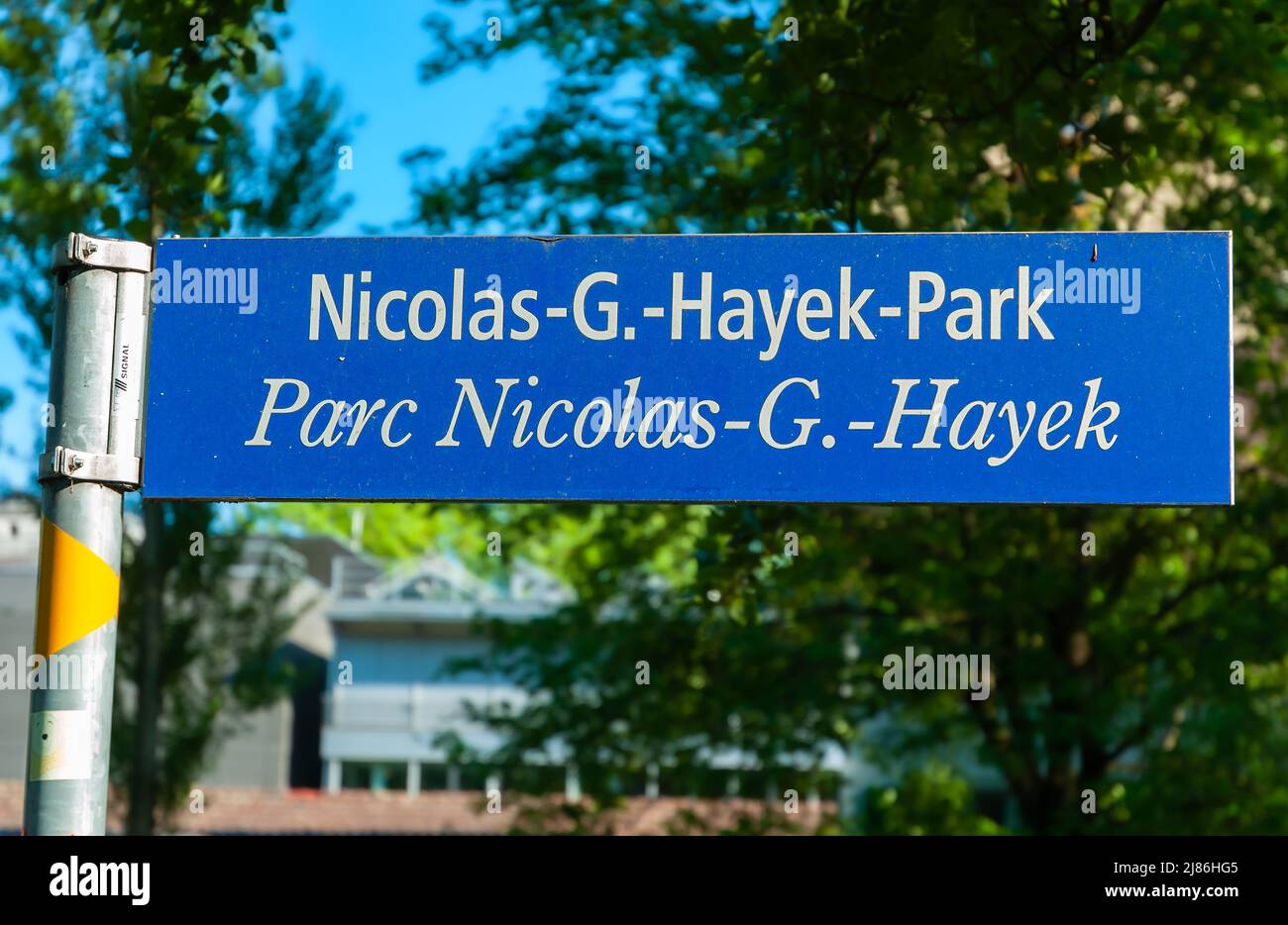 Biel, Switzerland - Mai 11, 2022: A street sign for Nicolas G. Hayek Park in Biel Stock Photo