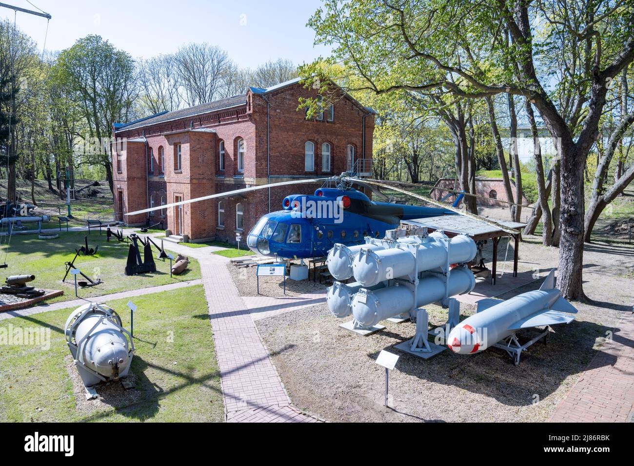 25 April 2022, Mecklenburg-Western Pomerania, Stralsund: A Mil Mi-8 helicopter developed in the Soviet Union stands on the grounds of the Dänholm Naval Museum. The military helicopter was used as a naval helicopter by the NVA in GDR times. On the island of Dänholm, between the mainland and Rügen, visitors can immerse themselves in naval history on Museum Day in a former barracks. The museum displays original objects from military seafaring such as uniforms and weapons, as well as photos, films and documents. Attractions also include a naval helicopter and a torpedo speedboat. Photo: Stefan Sau Stock Photo