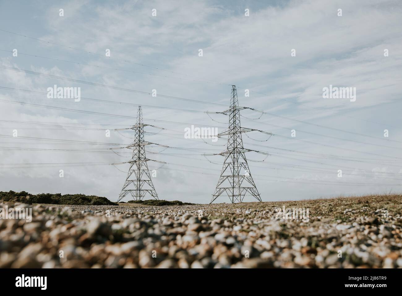 Power lines from Dungeness B Power Station over Romney Marsh, Kent Stock Photo