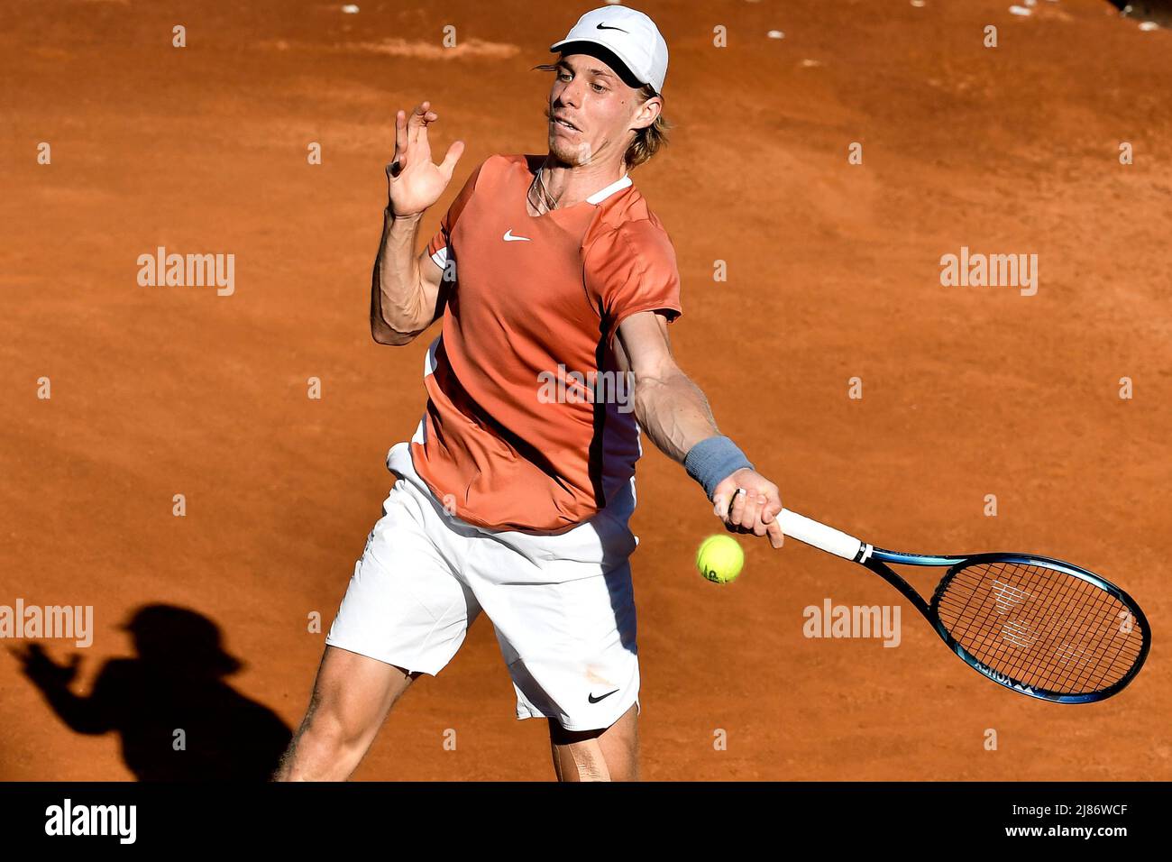 Rome, Italy. 13th May, 2022. Denis Shapovalov of Canada returns to Casper  Ruud of Norway during their round of 8 match at the Internazionali BNL  D'Italia tennis tournament at Foro Italico in
