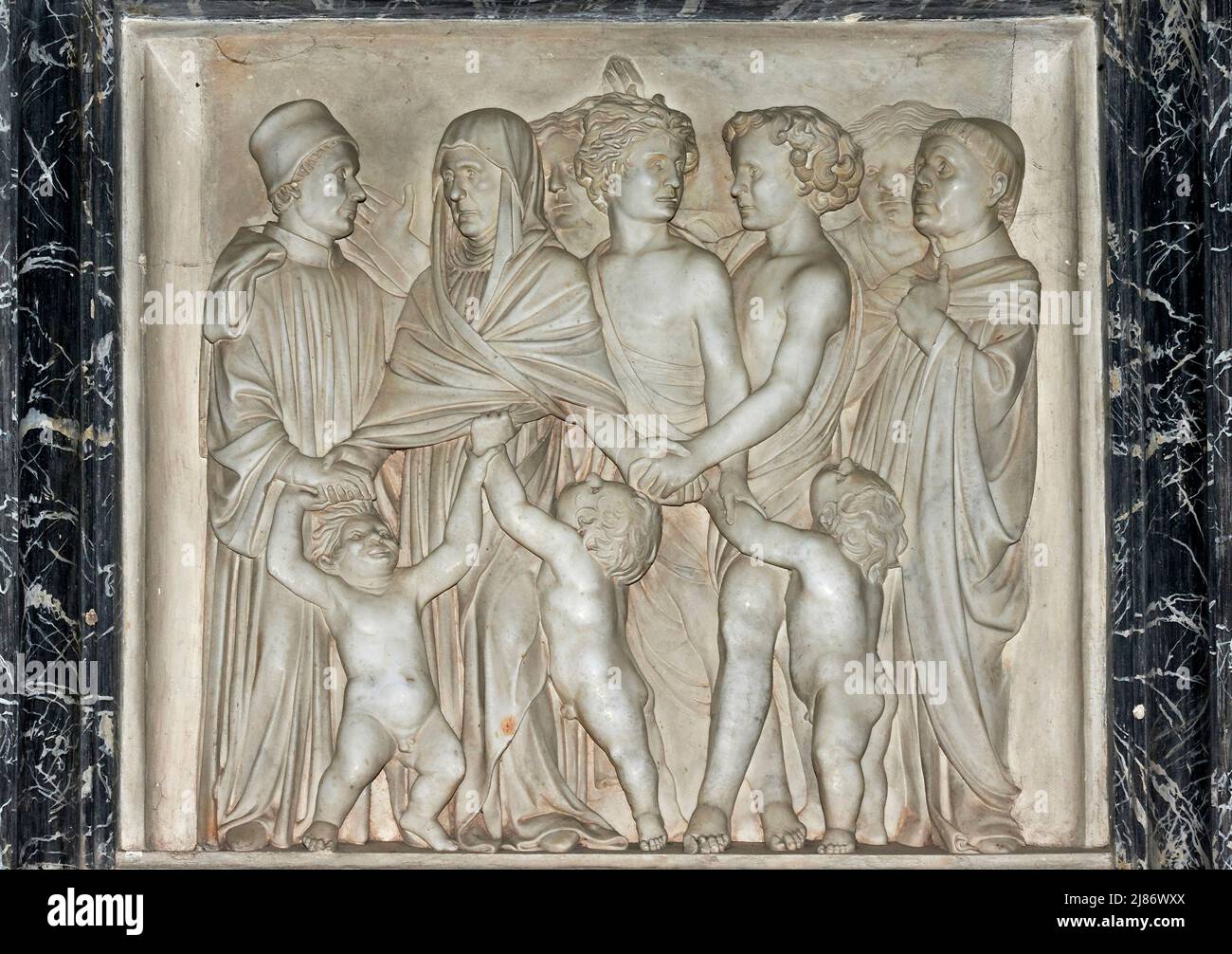 Il commiato della Madre del defunto ai suoi familiari - particolare del monumento funebre  di Bartolomeo Aragazzi   - marmo di Carrara  - Michelozzo - Stock Photo