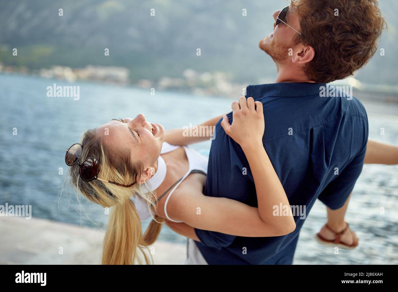 happiness romantic summer vacation.Young Couple in love laughing Stock Photo