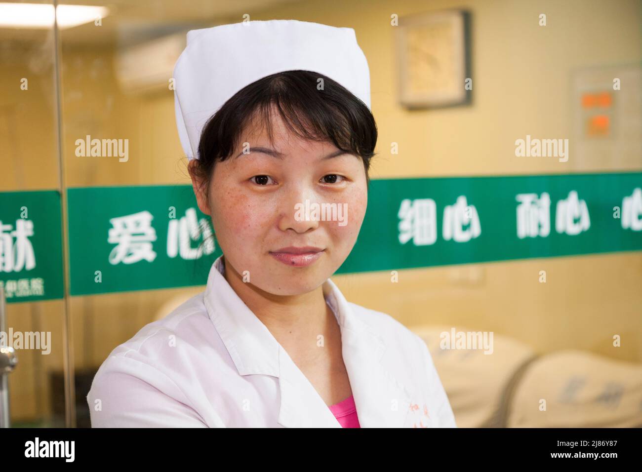 Nurse / nurses / female nursing medical staff, woman, in uniform on the ward reception desk area