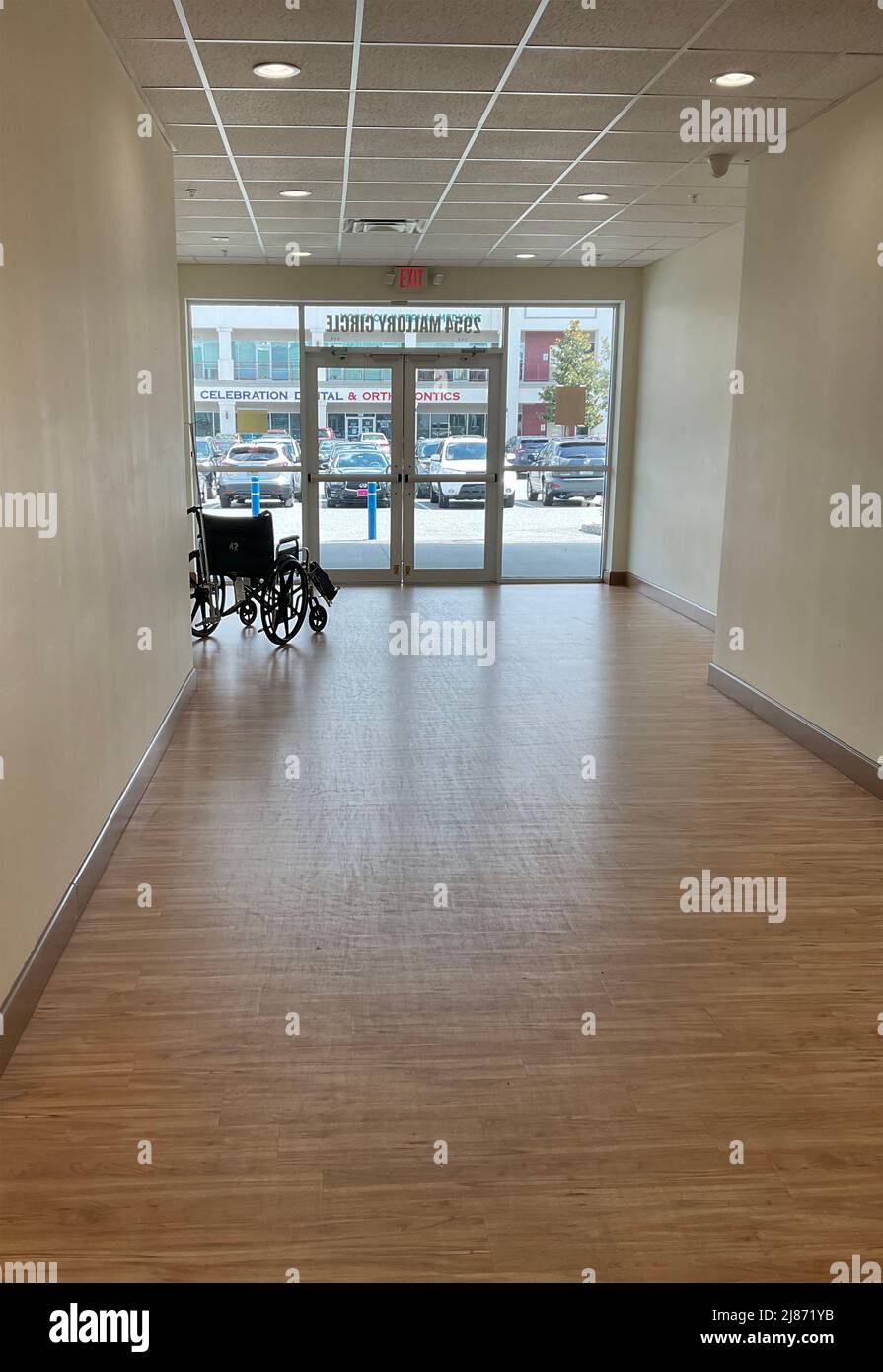 A lone wheelchair at an assisted living rehab center Stock Photo