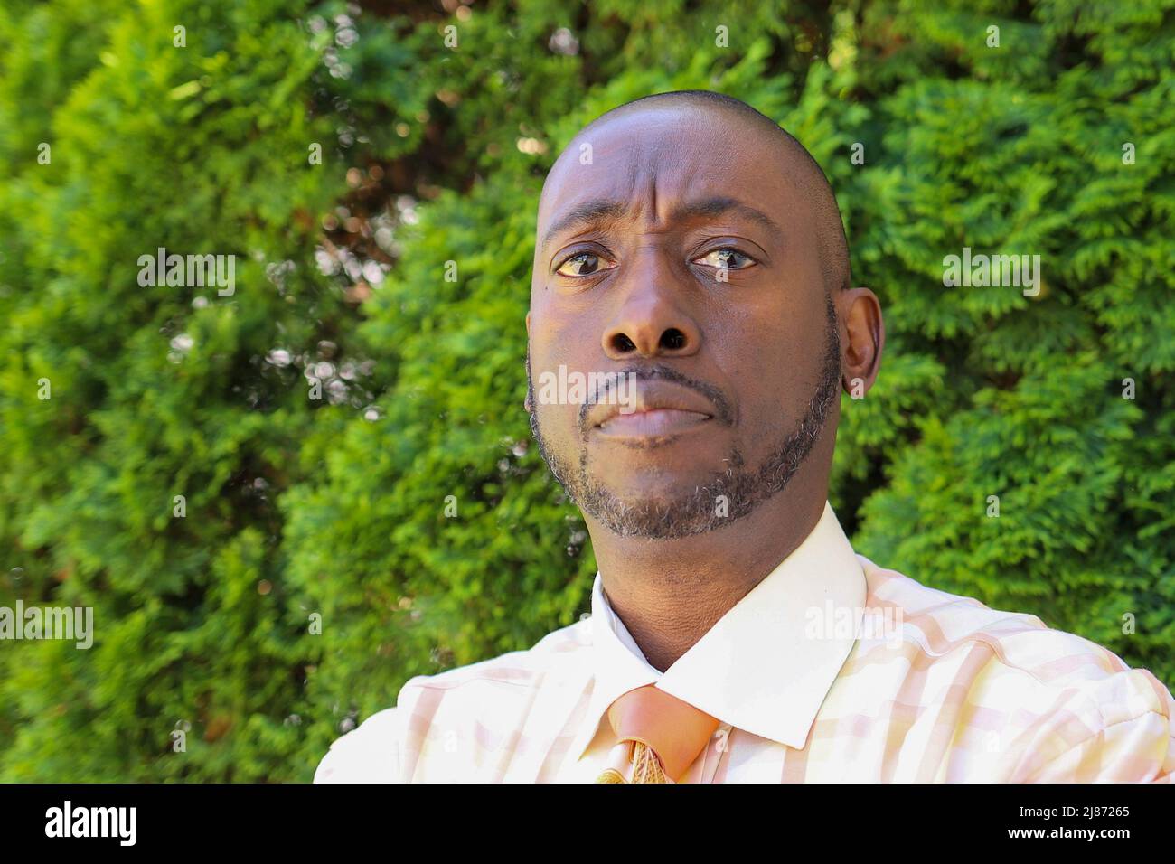 A portrait of a black African-American man looking serious and confident Stock Photo
