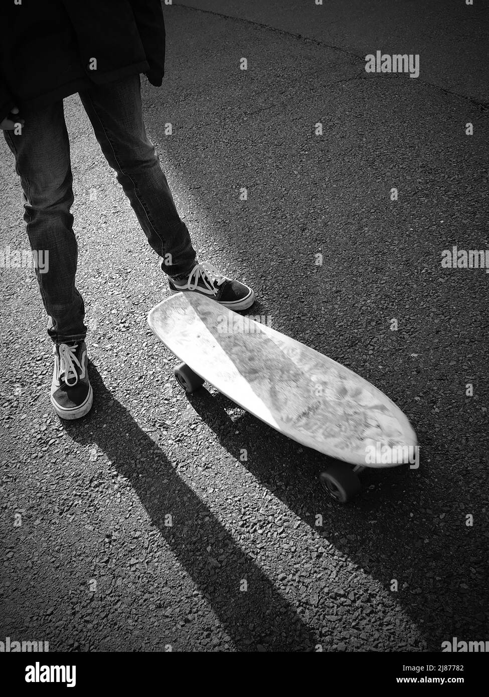 Skateboarder riding in the afternoon Stock Photo