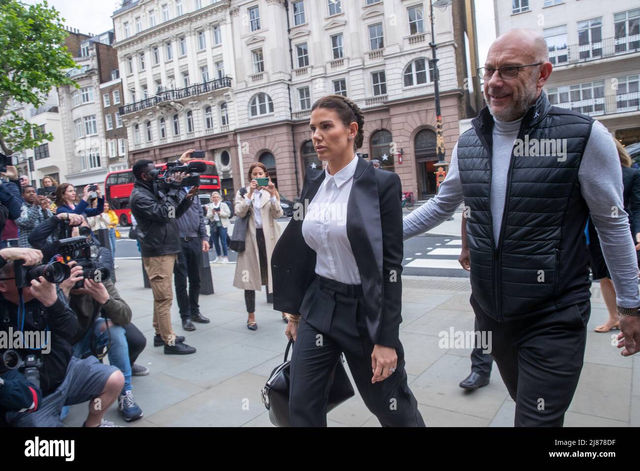 London, UK. 13th May, 2022. Rebekah Vardy arrives at The Royal Courts of Justice for her libel case with Coleen Rooney, Coleen Rooney who is the wife of Derby County manager and former England football player Wayne Rooney, and Rebekah Vardy, wife of Leicester City striker Jamie Vardy are locked in a libel battle also known as the 'Wagatha Christie' trial after accusations that Mrs Vardy leaked false stories about Mrs Rooney to the press. Credit: Lucy North/Alamy Live News Stock Photo