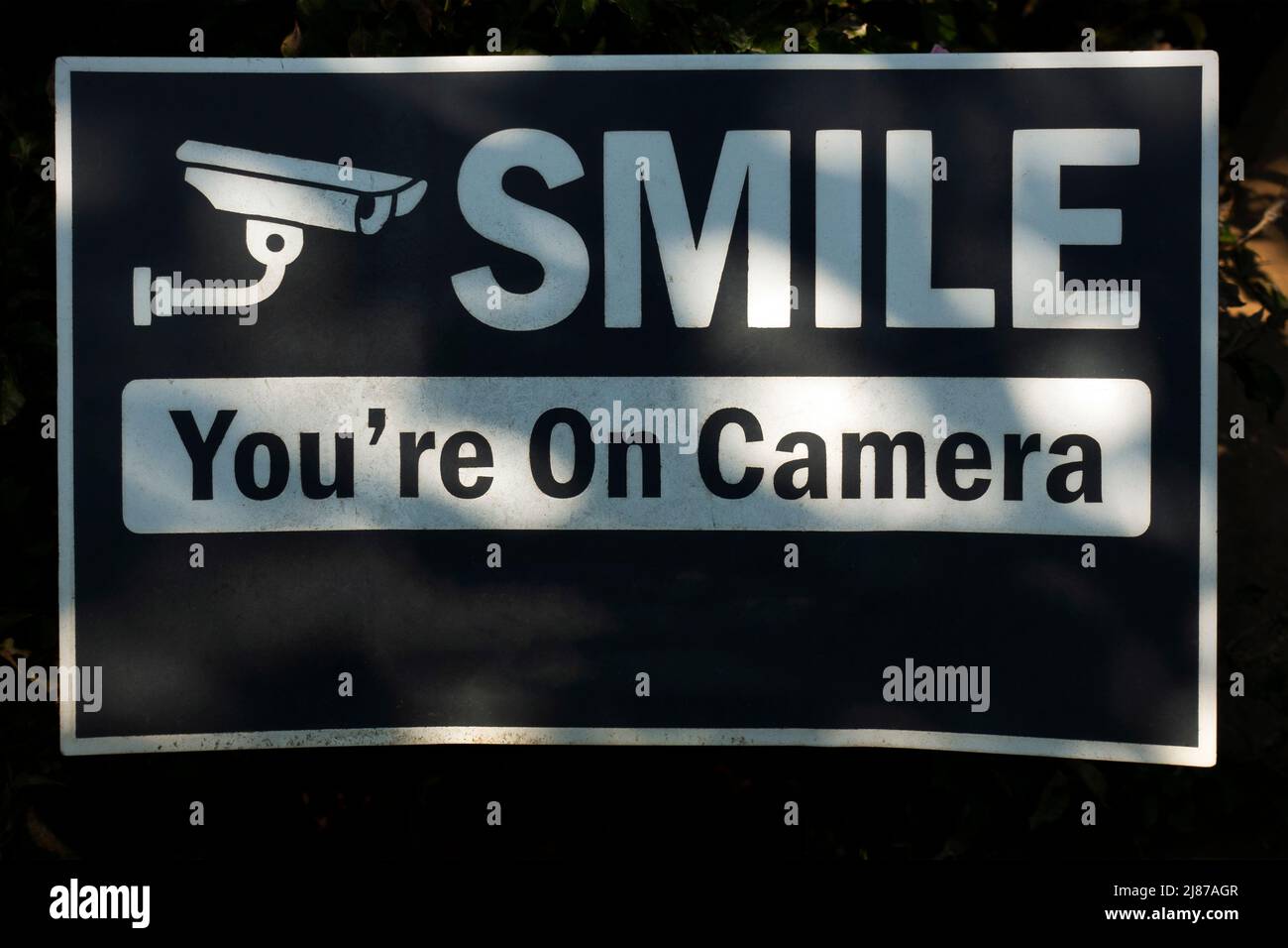 smile you're on camera security sign in Greenville SC Stock Photo Alamy