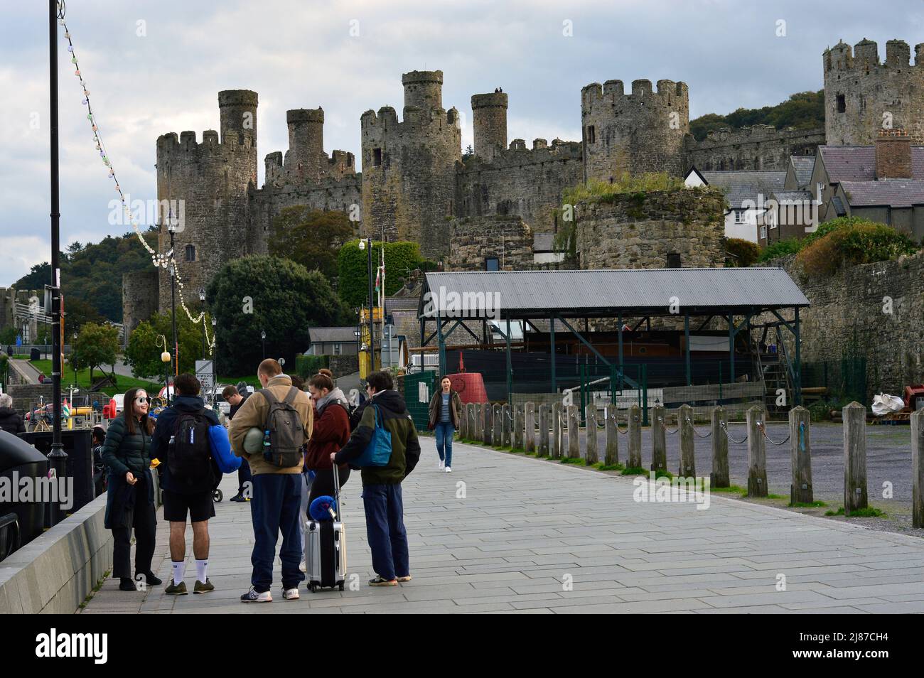 CONWY; CONWY COUNTY; WALES; 10-16-21. The Harbour on the River Conwy with the town's impressive castle built by King Edward 1st in the background. Stock Photo
