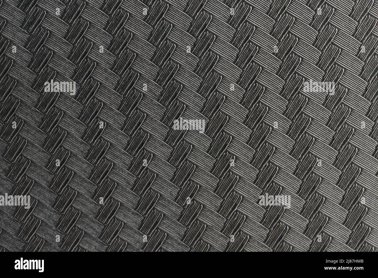 Highly detailed carbon fiber material texture or background that tiles  seamlessly as a pattern in any direction Stock Photo - Alamy