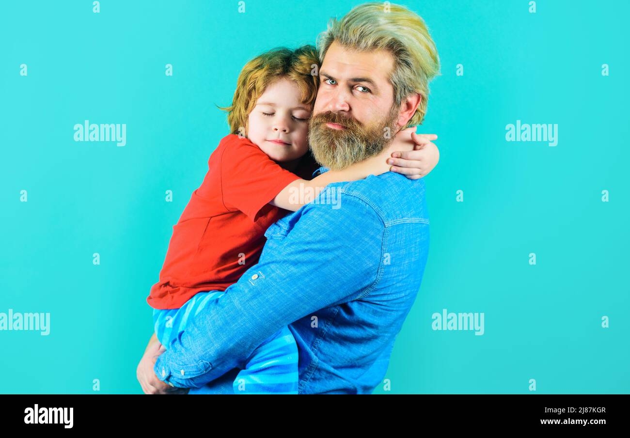 Fathers day. Father and little son hugging. Family relationships. Parenthood and childhood concept. Stock Photo