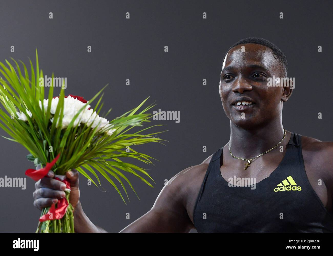 Doha, Qatar. 13th May, 2022. Anderson Peters of Grenada celebrates after winning the men's
